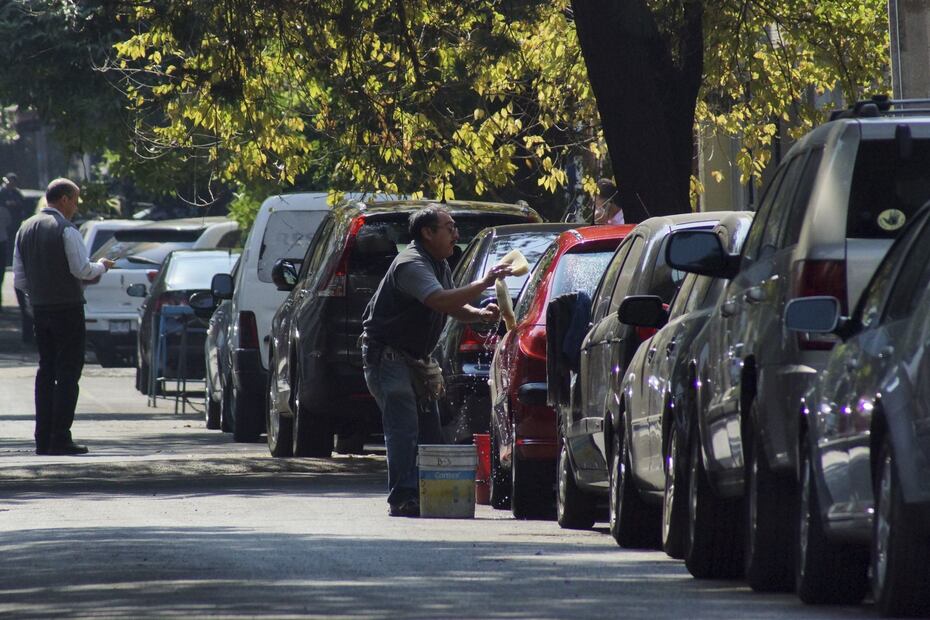 El trabajo de los franeleros en la capital (Foto: Cuartoscuro)
